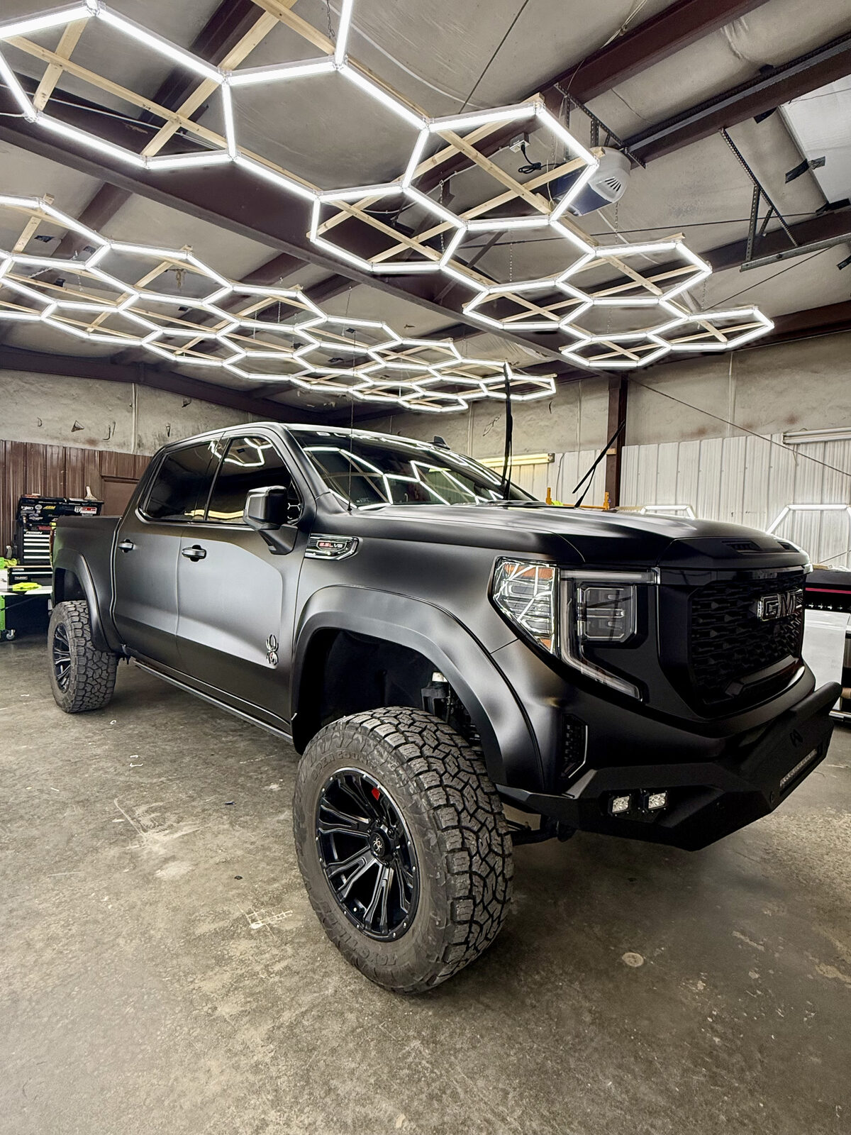 Faded truck paint restored to a deep glossy finish